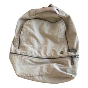 LuLu Lemon backpack. tan. insert for laptop and lots of room. 
Approx 16h x14 w